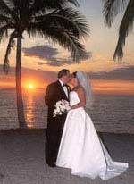 Sunset wedding picture of bride and groom