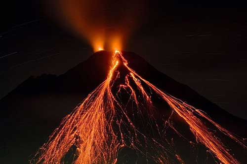 Arenal Volcano lava flowing at night