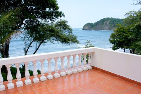 Balcony overlooks the ocean from this Playa Flamingo rental