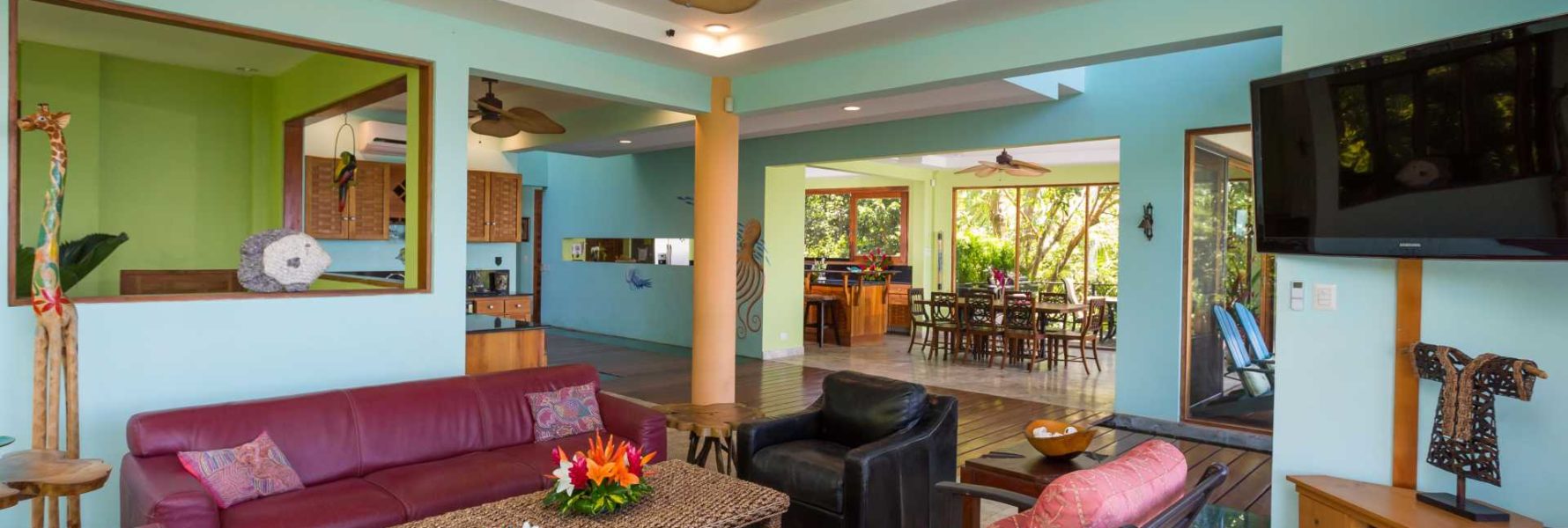 The common areas include a large entertainment area, bar, and dining room. A vacation villa for any occasion.