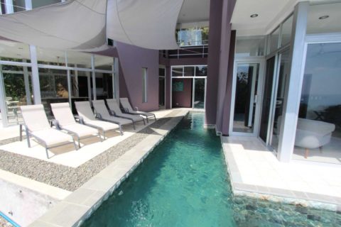 pool-cuts-through-the-villa