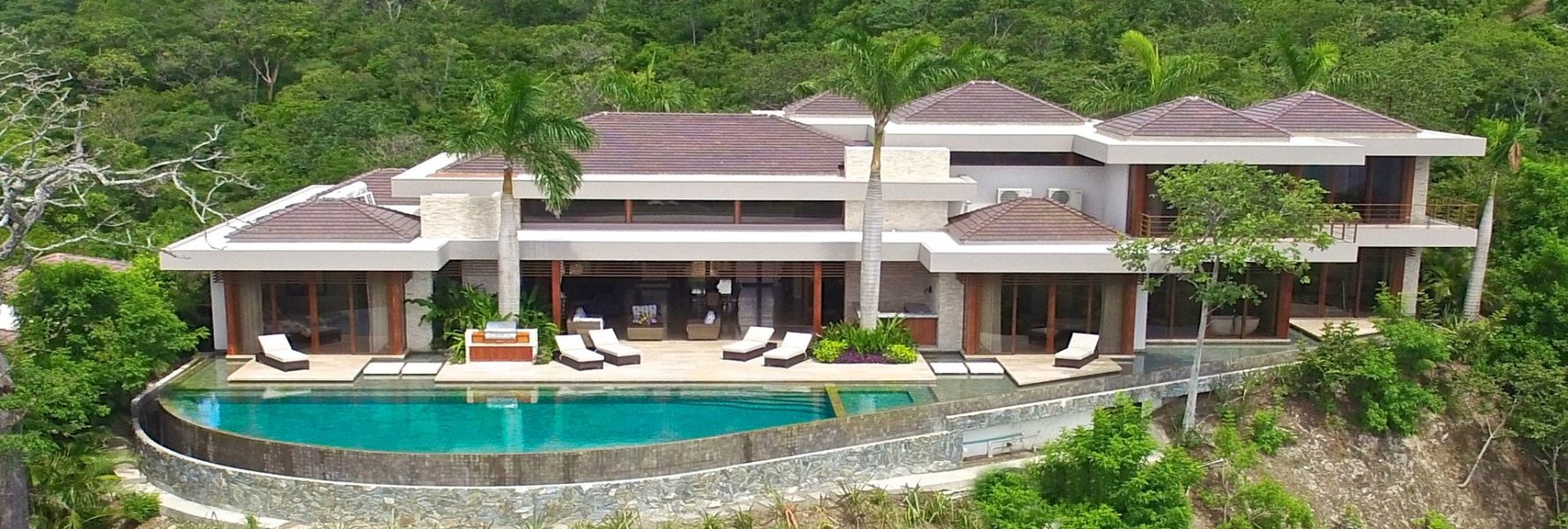 This incredible contemporary villa in Playa Hermosa defines luxury. This villa is sleek and spacious with amazing ocean views. 
