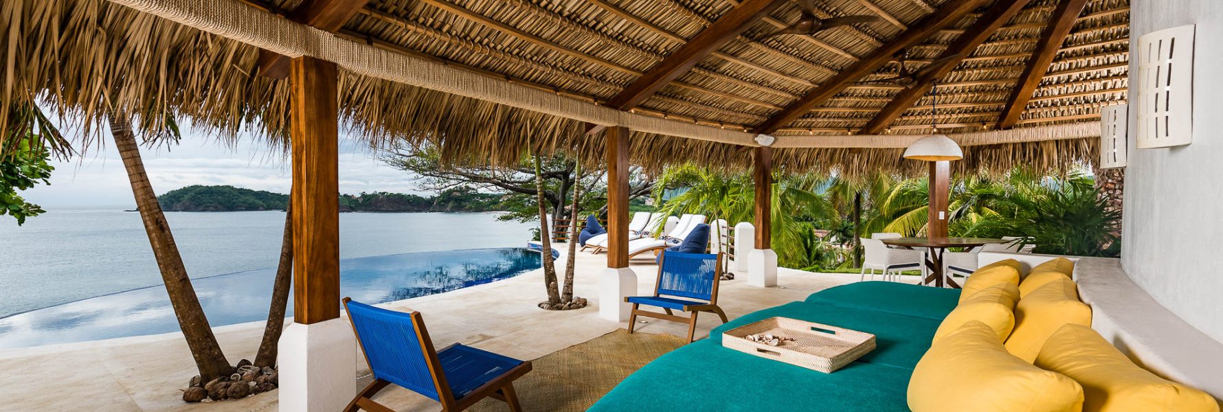 Sit back and relax with this amazing sitting area overlooking the pool and ocean.
