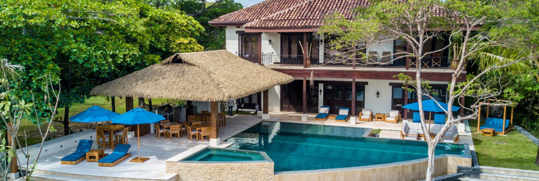 This beautiful vacation home located in Tamarindo Costa Rica has a large pool to swim in.