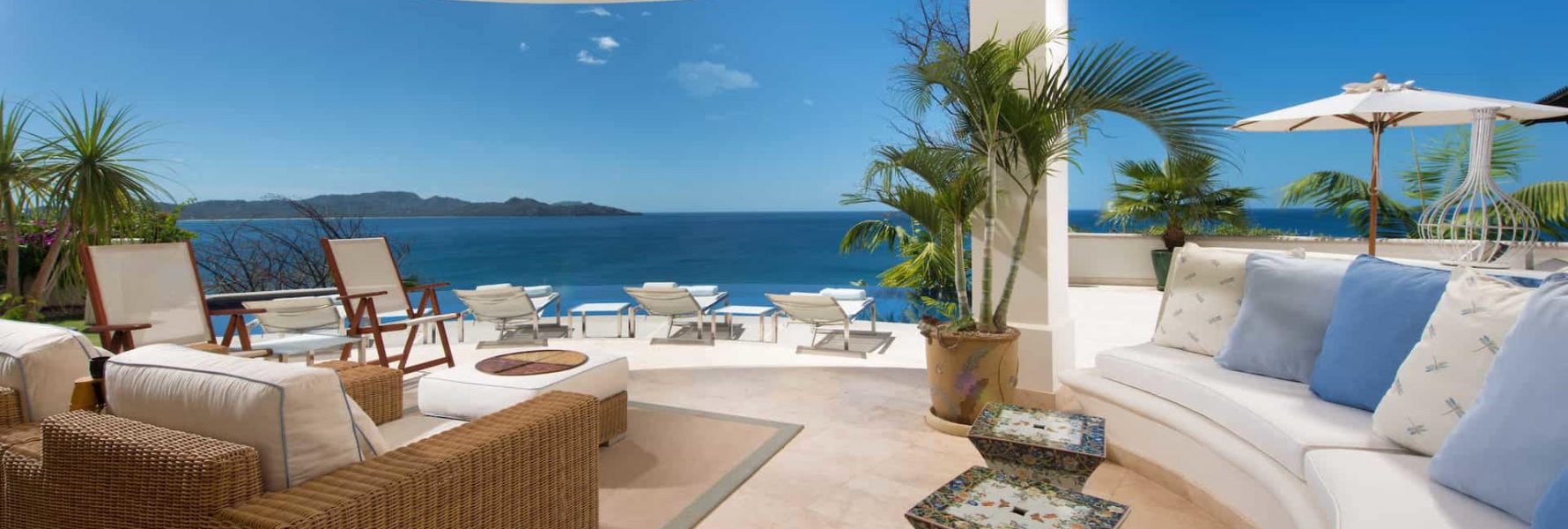 You will enjoy staying at this stunning villa sitting beachfront to Playa Flamingo.
