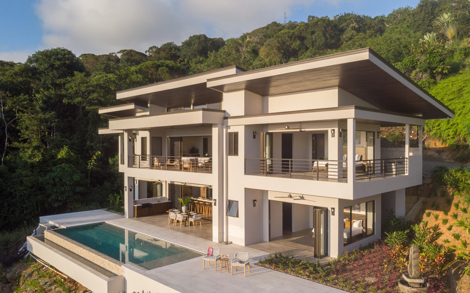 This multi-level luxury home sits high above the Pacific and has a private pool. 