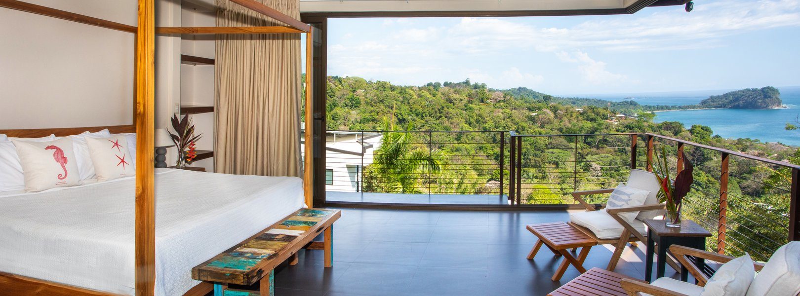 The sky suite on the top level can be opened up to enjoy the ocean breeze and natural surroundings of Manuel Antonio.