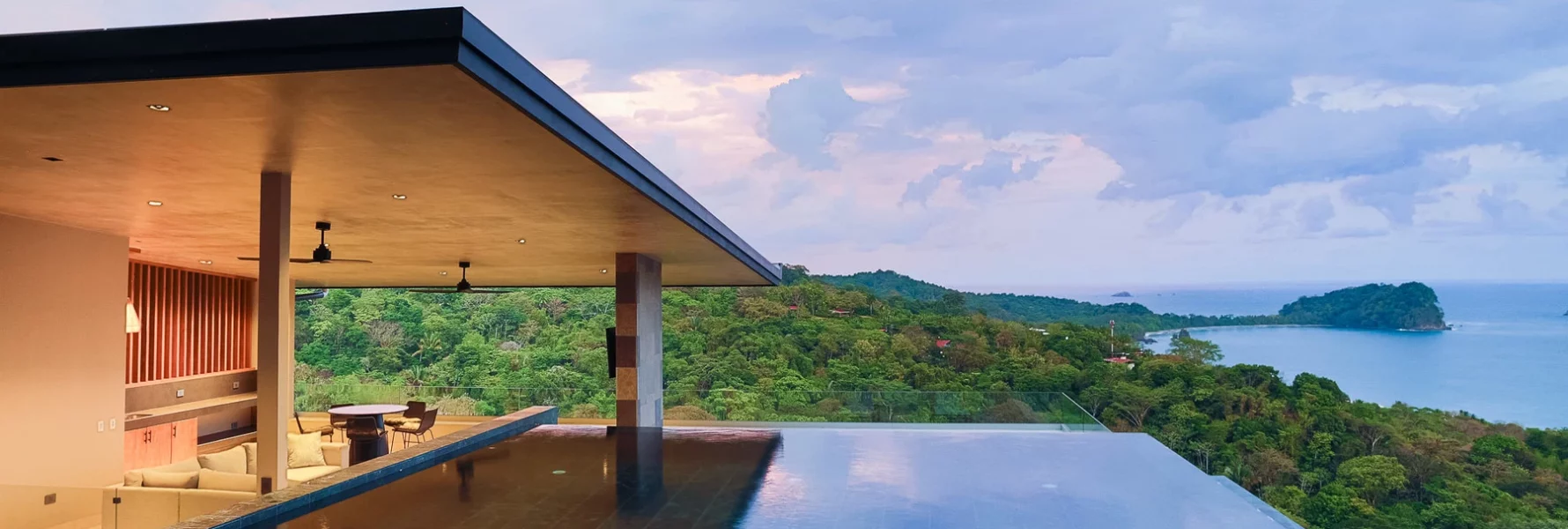 The rooftop infinity saltwater pool of this stunning villa has one of the best views in all of Manuel Antonio.