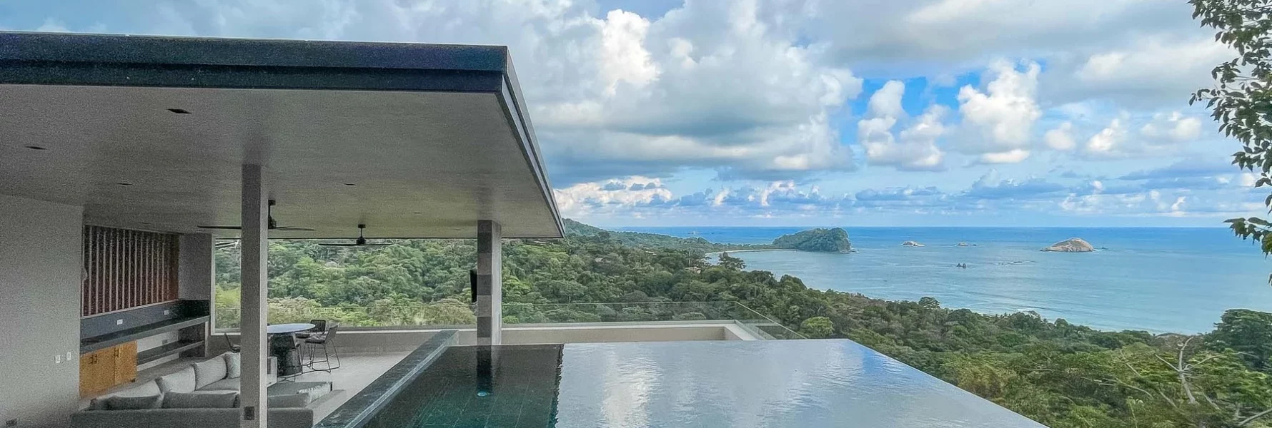 The infinity pool with its beautiful dark green tiling is the ultimate spot in the villa to chill and enjoy the view.